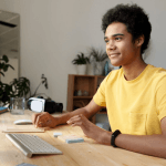 A man learning a language online.