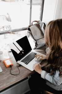 A woman learning a language online.